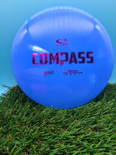 Load image into Gallery viewer, Latitude 64 Gold Plastic Compass Midrange